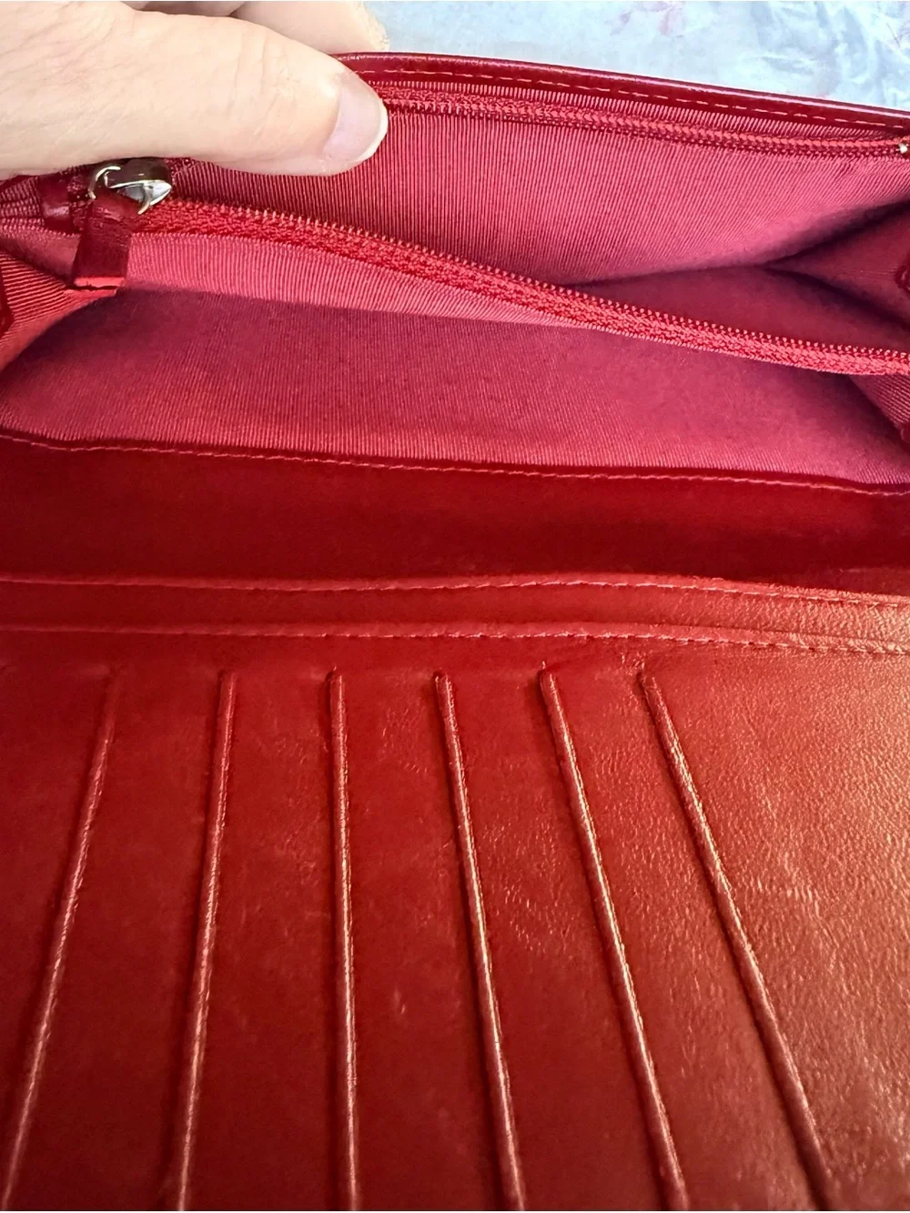 Authentic CHANEL Quilted Red Lambskin Leather Long Wallet with Silver CC Emblem.
